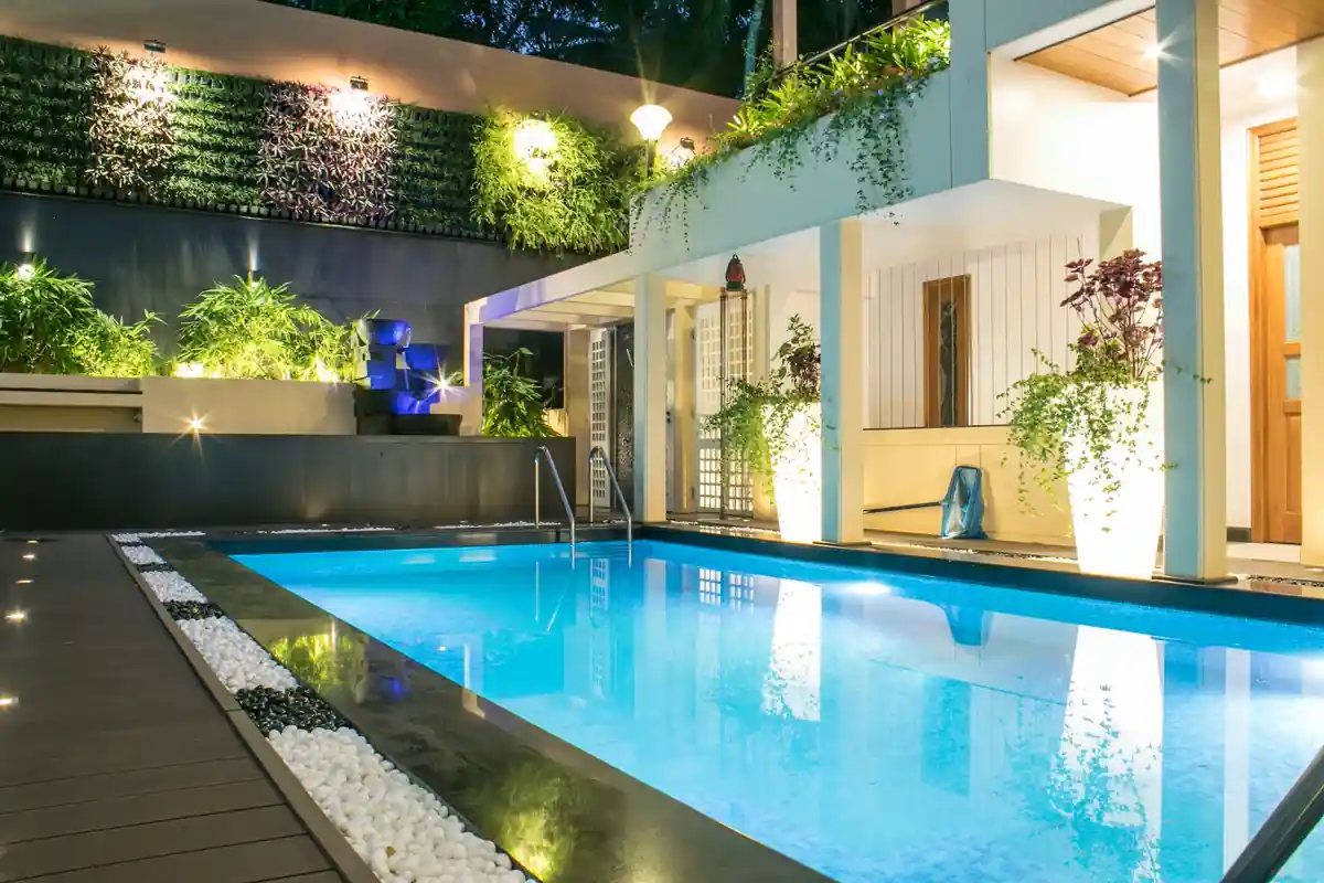 Pool and green wall landscaping in Trivandrum - landscape design by Radianz, architects in Trivandrum