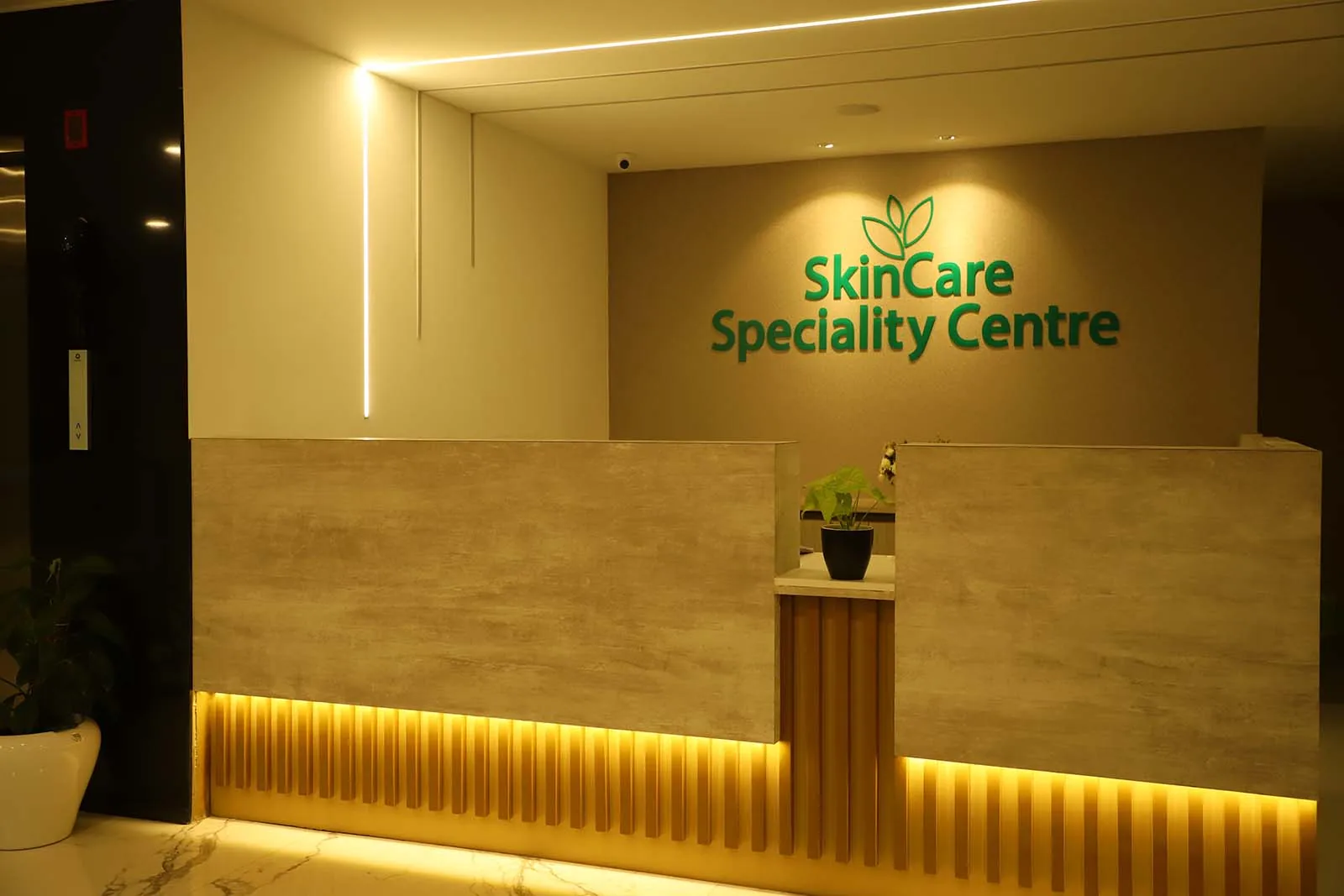 Reception signage at Skincare med-spa, Kerala - wellness clinic interior design by Radianz, architects in Trivandrum