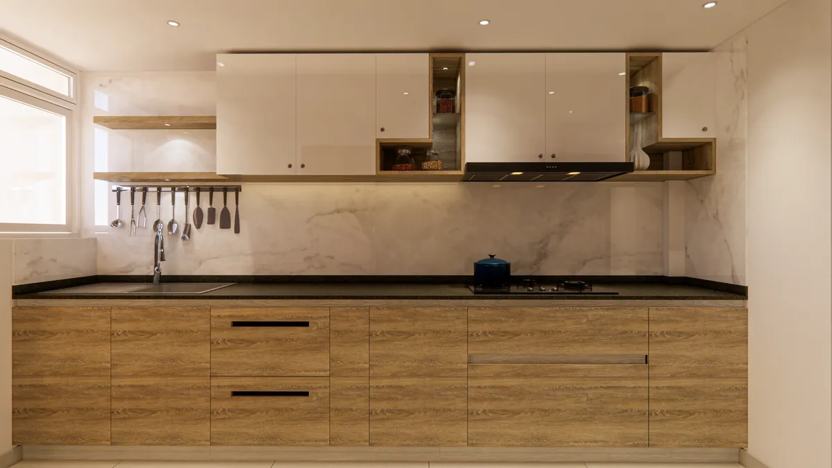 Straight-run kitchen with wood-finish base cabinets, white overhead shutters and a marble backsplash