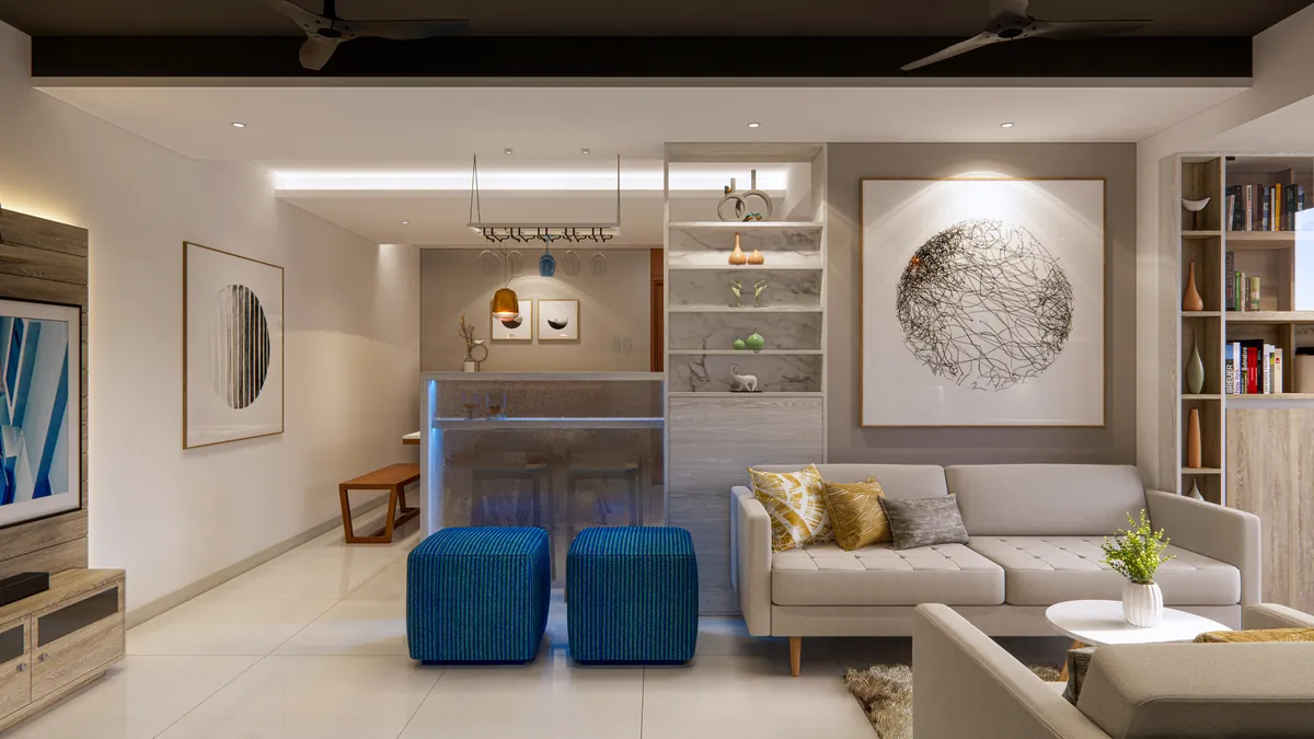 Living room with an L-shaped sofa, two blue ottomans, open bookshelves and a round artwork on the wall